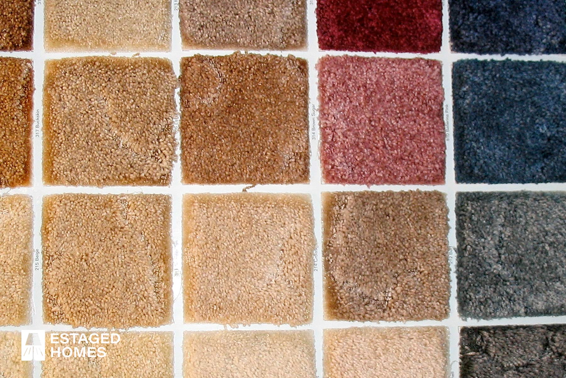 Swatches of different carpeting colors an materials
