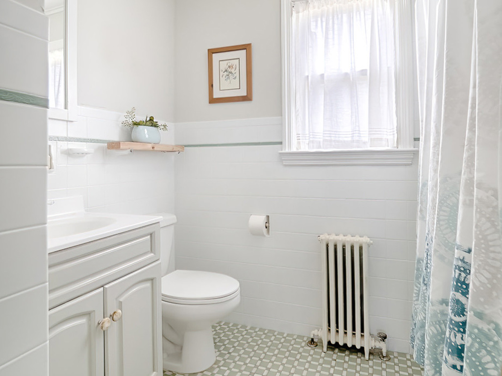 View of first floor bathroom after the home was staged by eStaged Homes