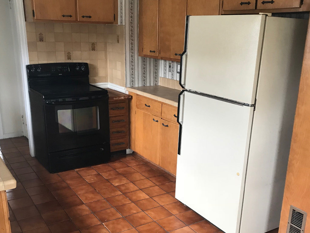 View of the kitchen at 154 Kenmore Rd. before we staged the home
