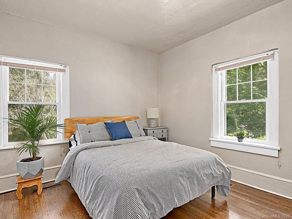 View of the master bedroom at 125 Naples Road after we staged the home