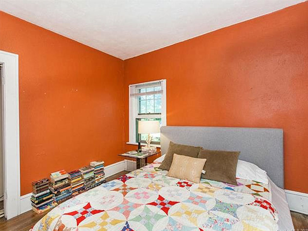 View of the master bedroom at 125 Naples Road before we staged the home