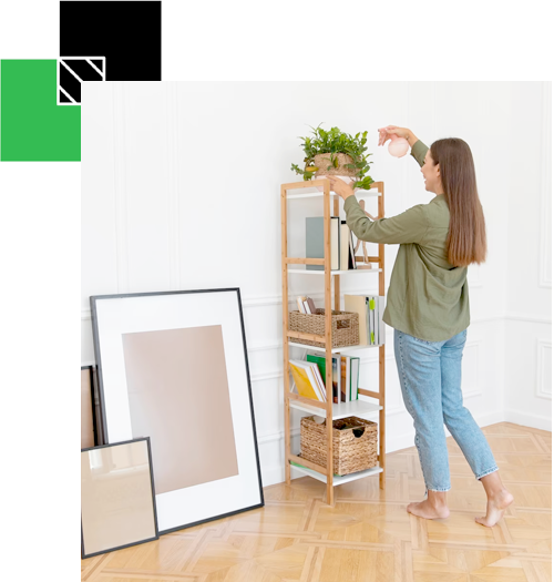 View of a home stager preparing a room for sale 