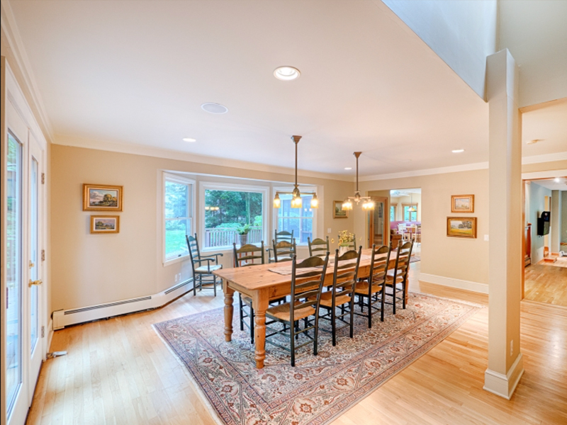 View of the dining room at 145 Wilson Rd. after it was staged by a certified professional home stager from eStaged Homes